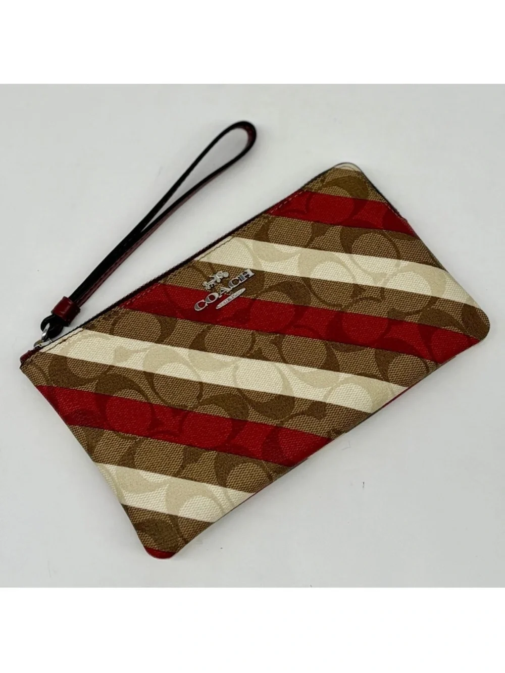 Large Corner Zip Wristlet In Signature Canvas With Diagonal Stripe Print